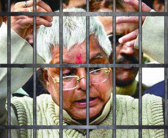 Lalu Prasad Yadav gets 5 year jail term,  loses Parliamentary seat,  Lalu gets Jail for 5 years,   Lalu Prasad yadav,  Lalu Fodder Scam case, Fodder Scam, national news, political news 2013, Politics updates.